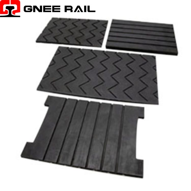 What is the function of rail pads?